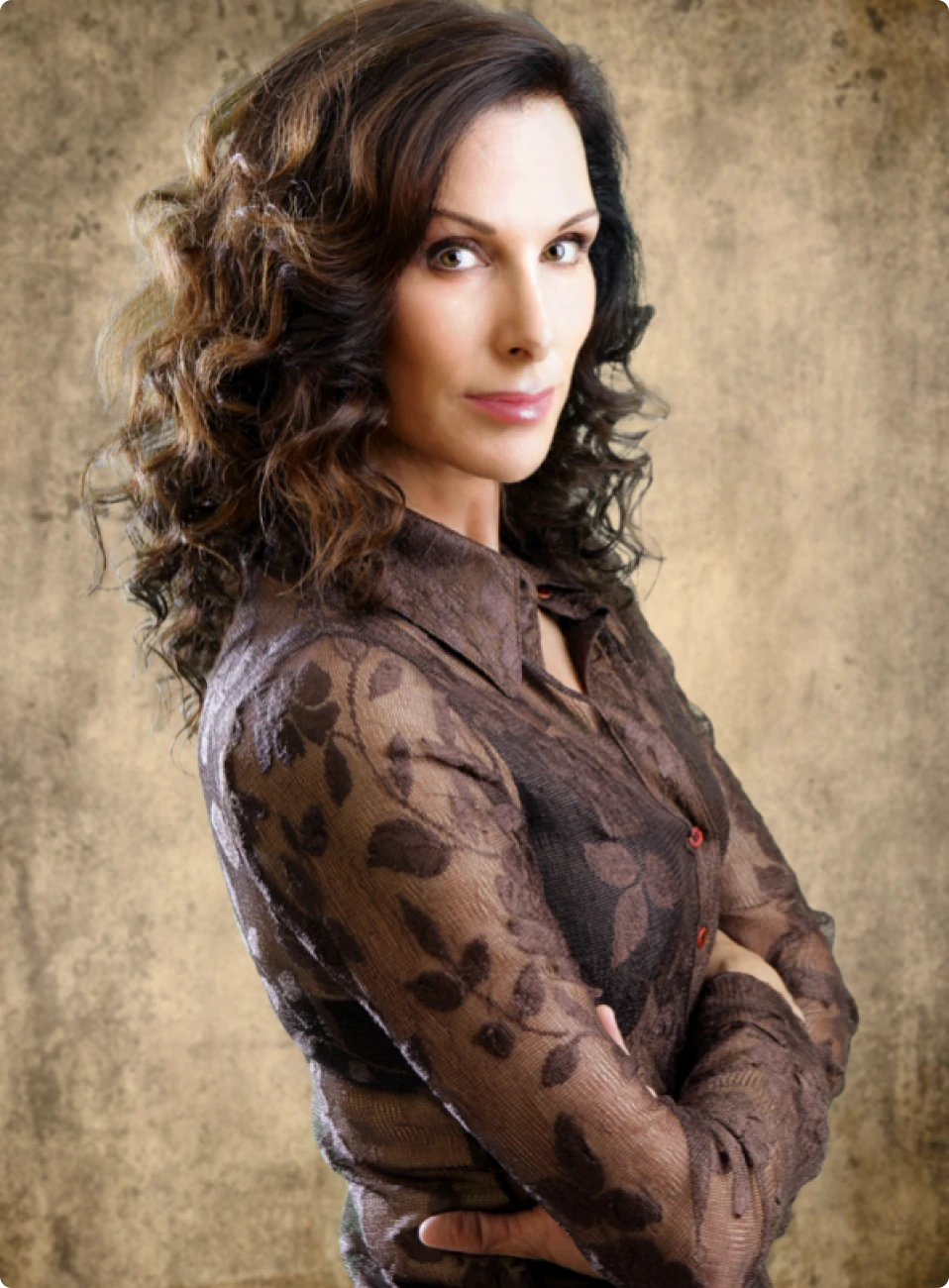 Confident woman in brown patterned shirt